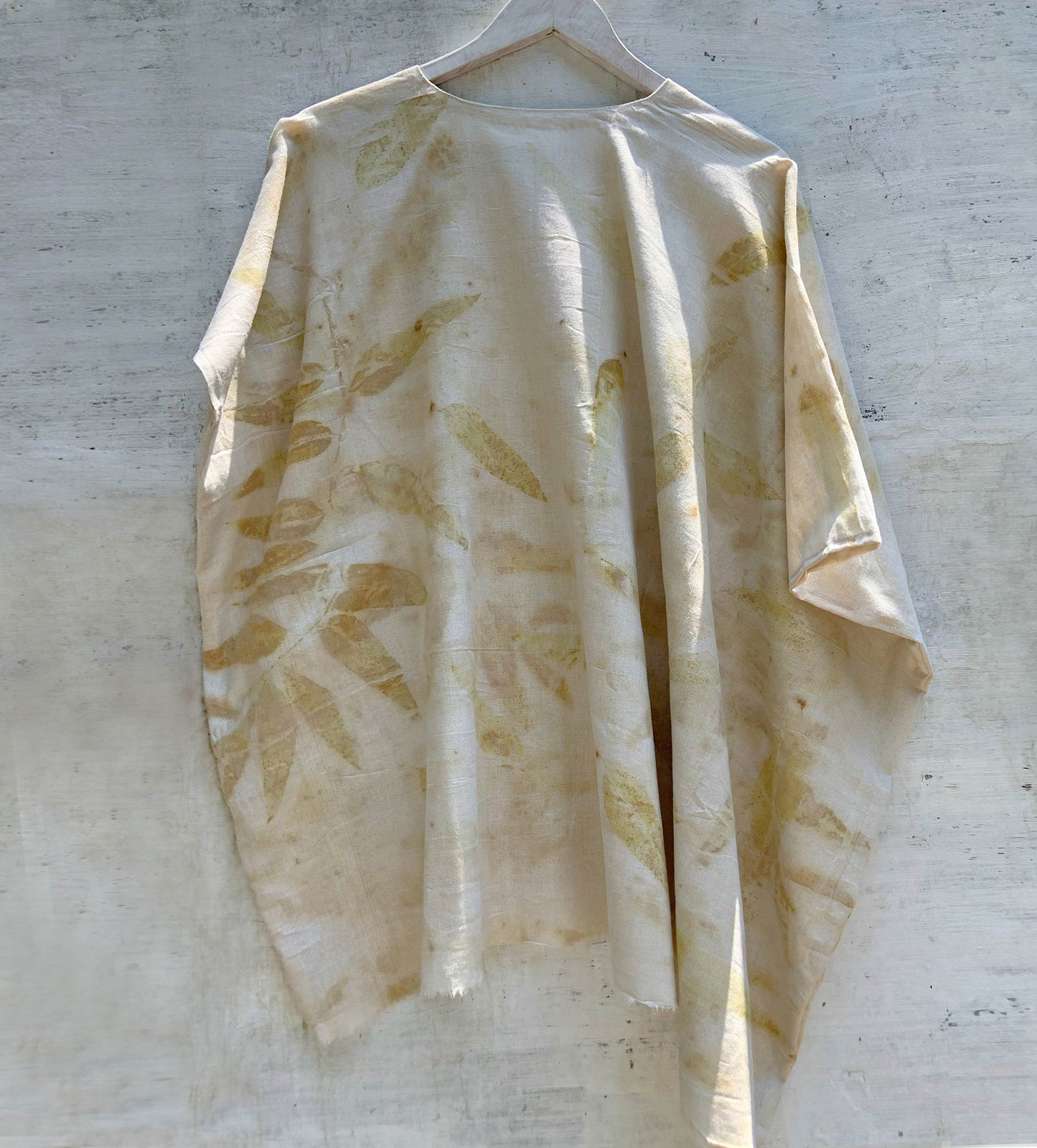 back of handloom kaftan eco printed with eucalyptus leaves