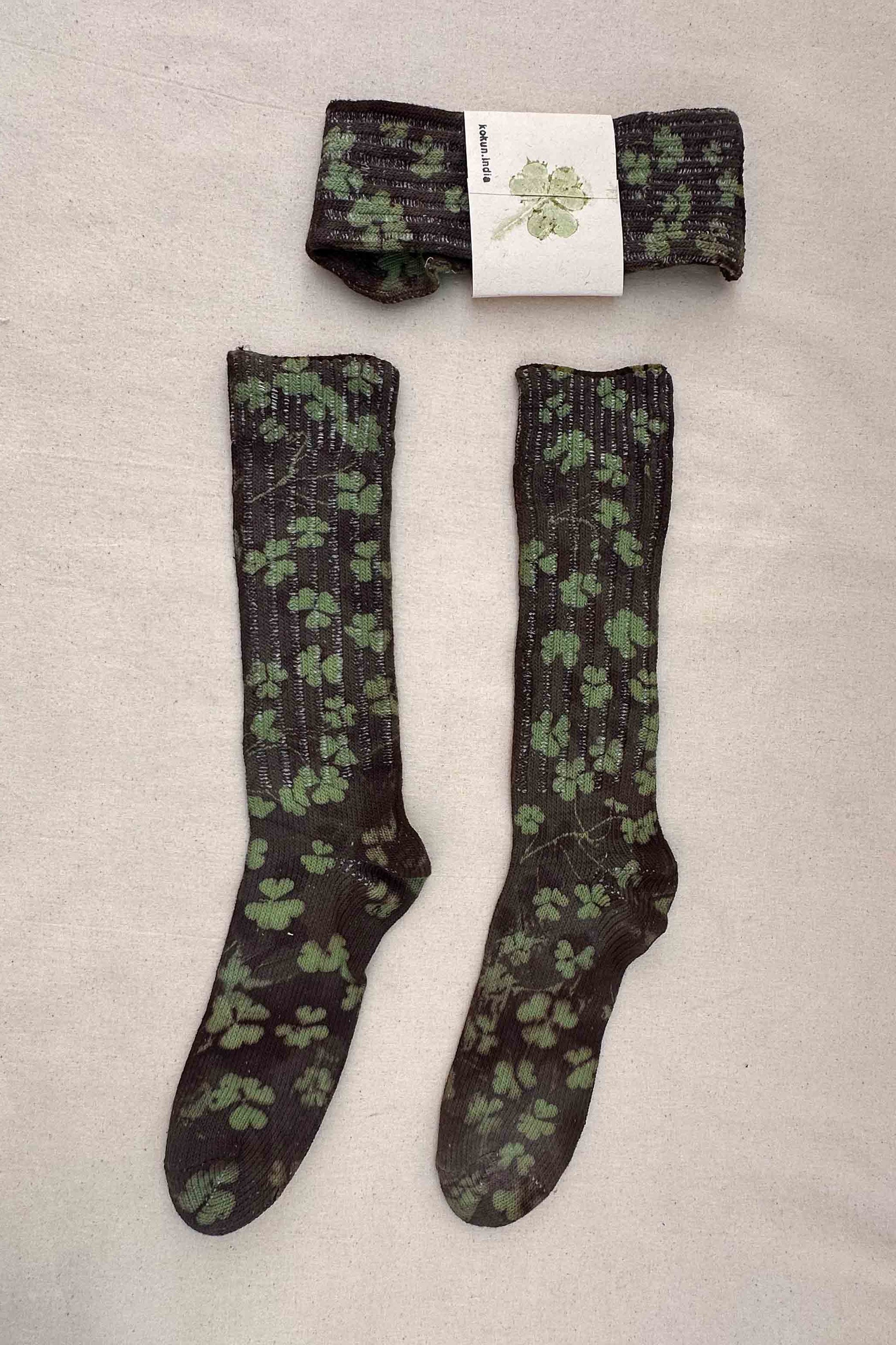 Pair of botanically printed socks with clovers 